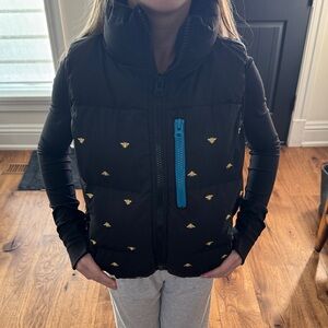 Black Puffer Vest with Gold Accents